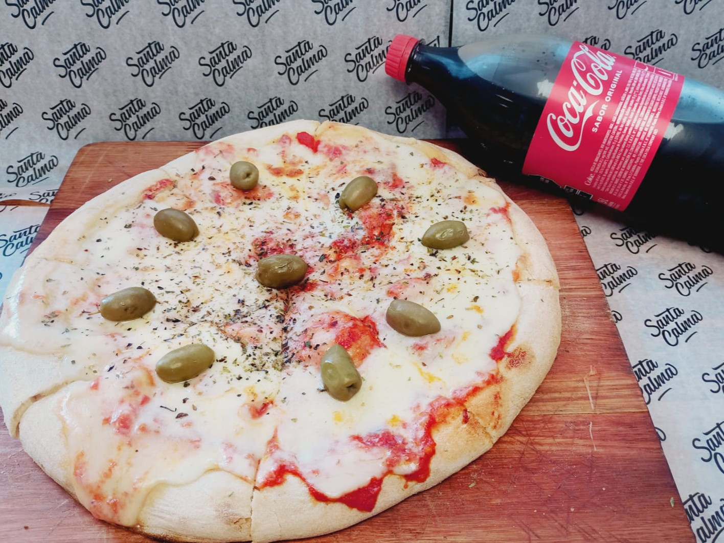 1 pizza muzza 8 porciones + gaseosa 1 1/2