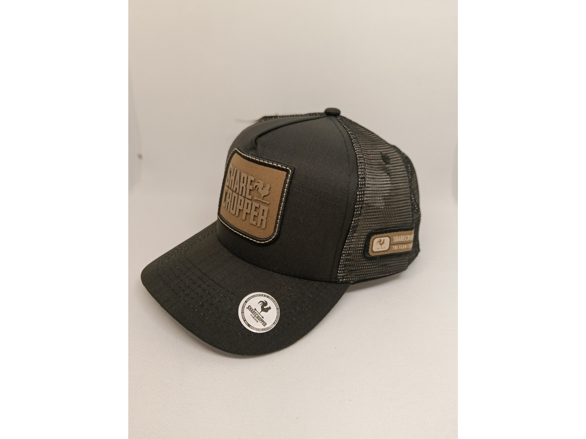 Sharecropper (Tela tipo ripstop negra, red negra, aplique marron)