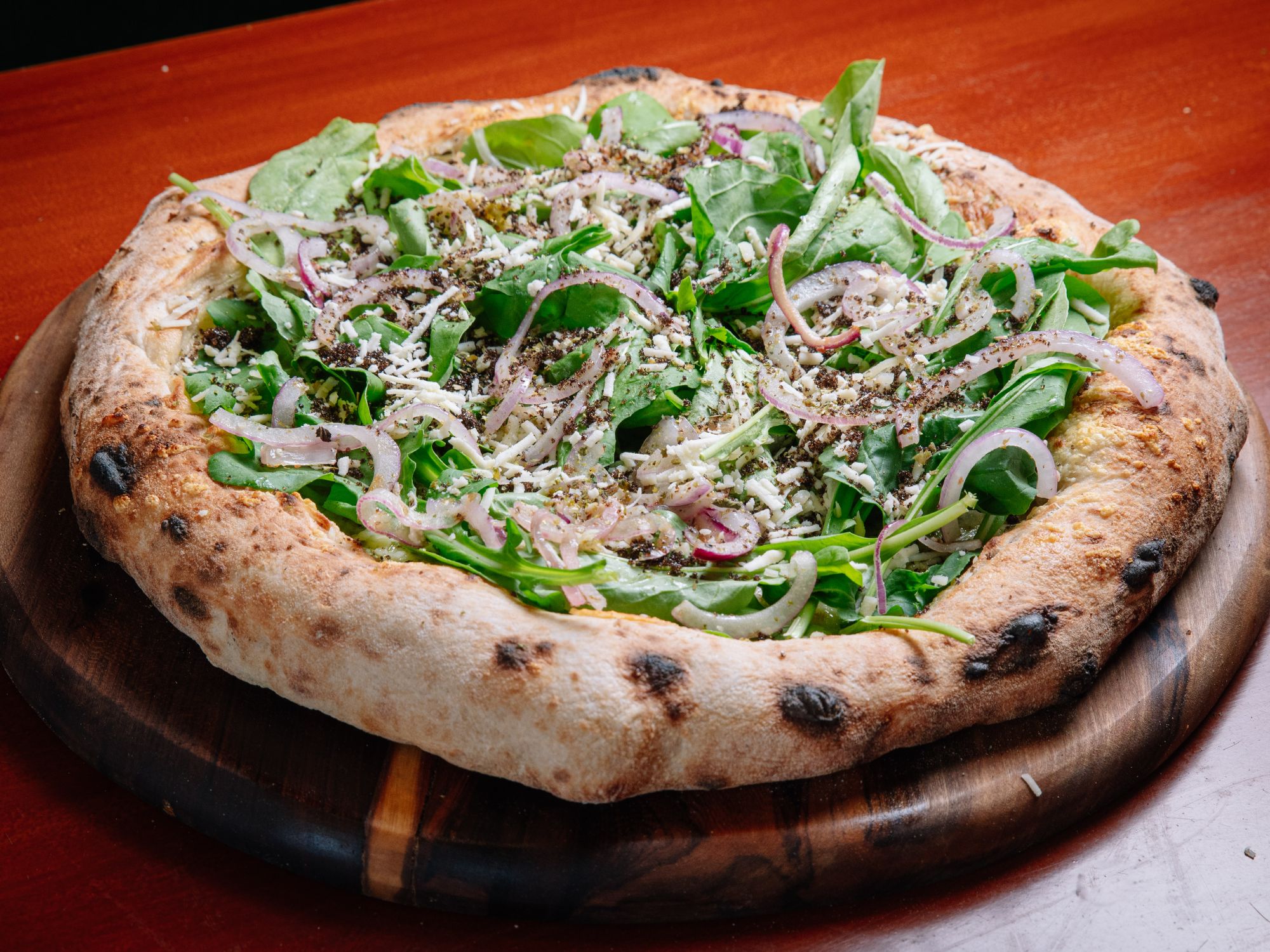 Rúcula cebolla caramelizada