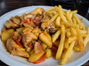 Pollo al disco con papas fritas