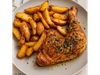 Pollo al horno con papas fritas.