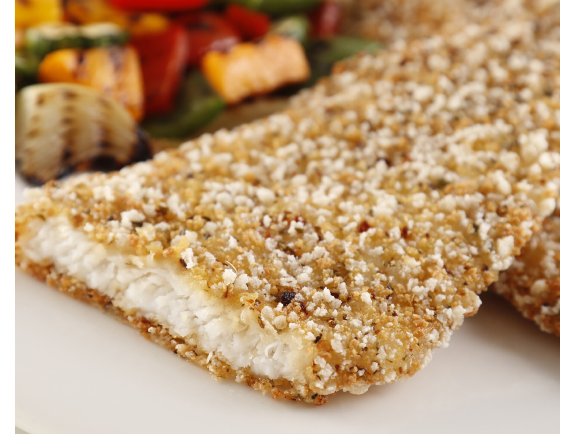 Milanesa de merluza con finas hierbas