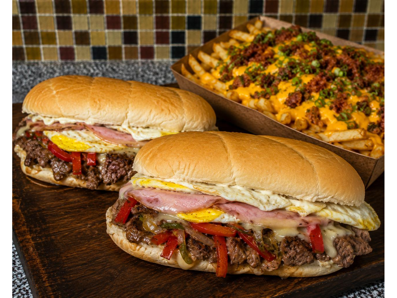 2 LOMOS COMPLETOS + PAPAS CON CHEDDAR