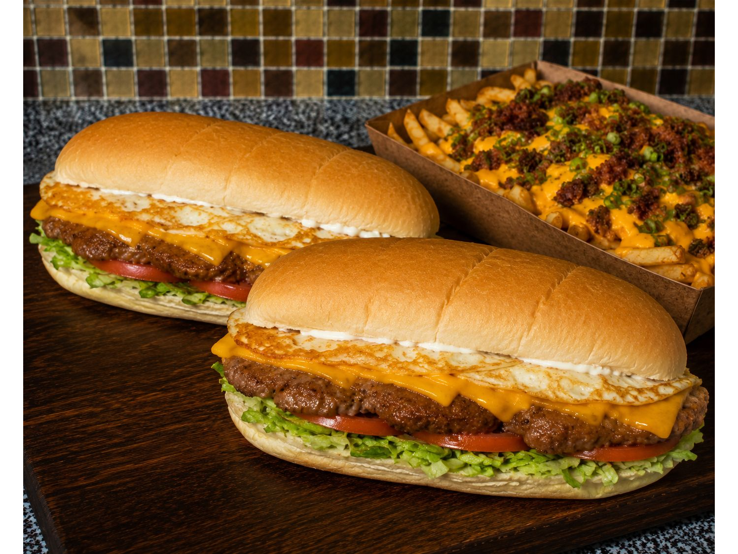 2 LOMOS CHEDDAR + PAPAS CON CHEDDAR