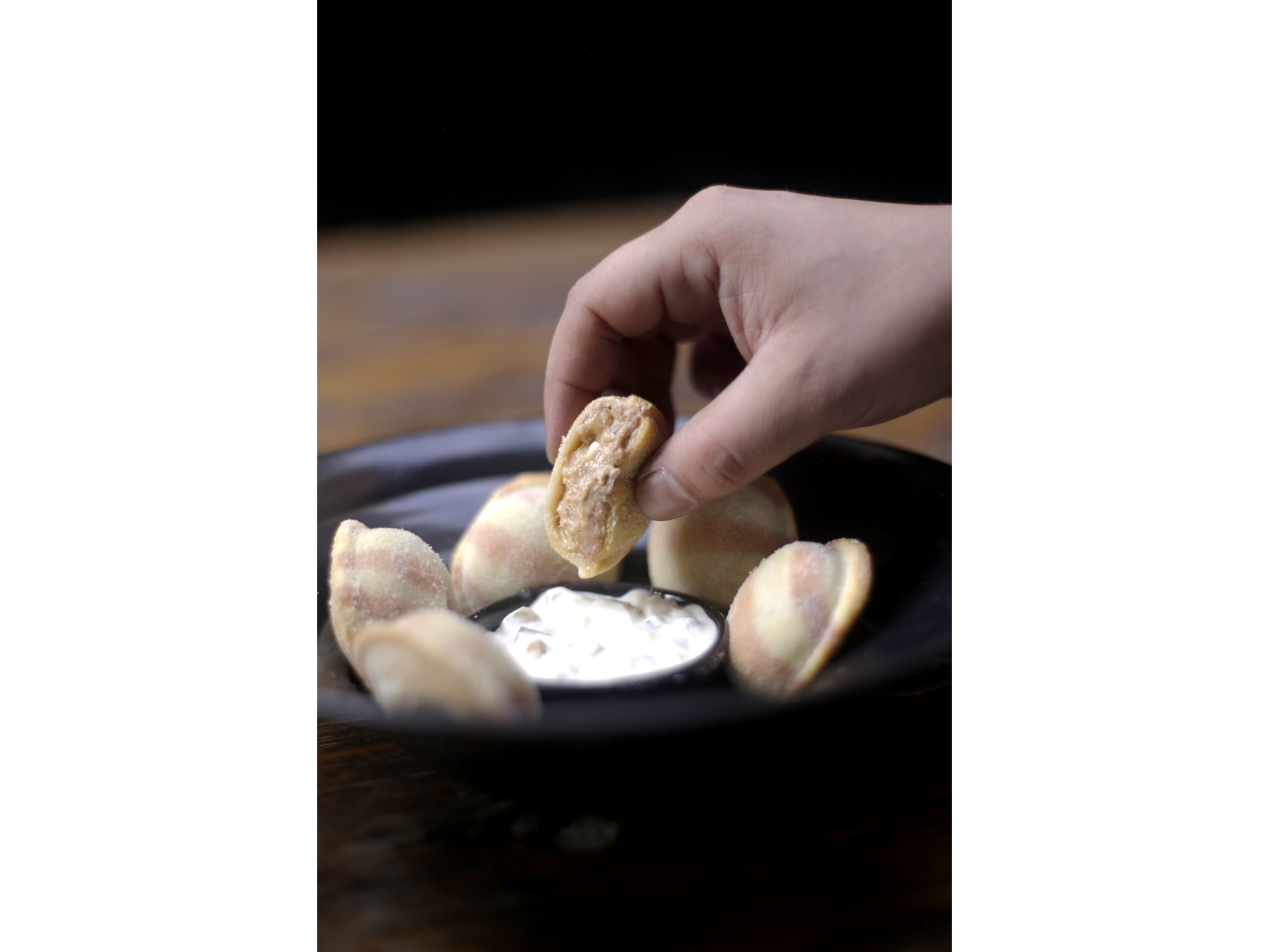 Sorrentinos fritos de osobuco al malbec