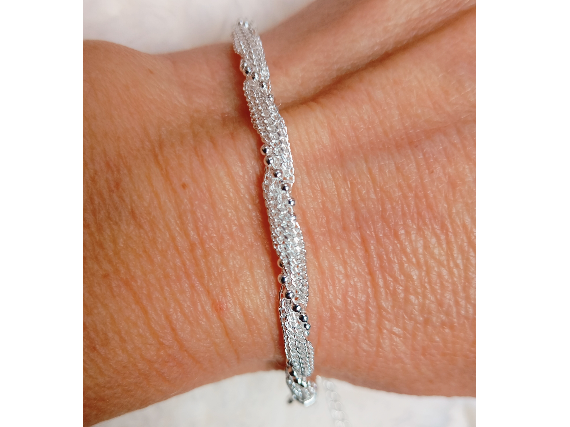 Pulsera entrelazada con con cadena